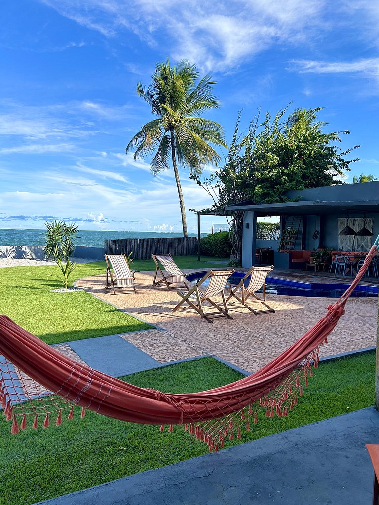 Casa Ilha| beira mar, piscina aquecida, 4 suítes