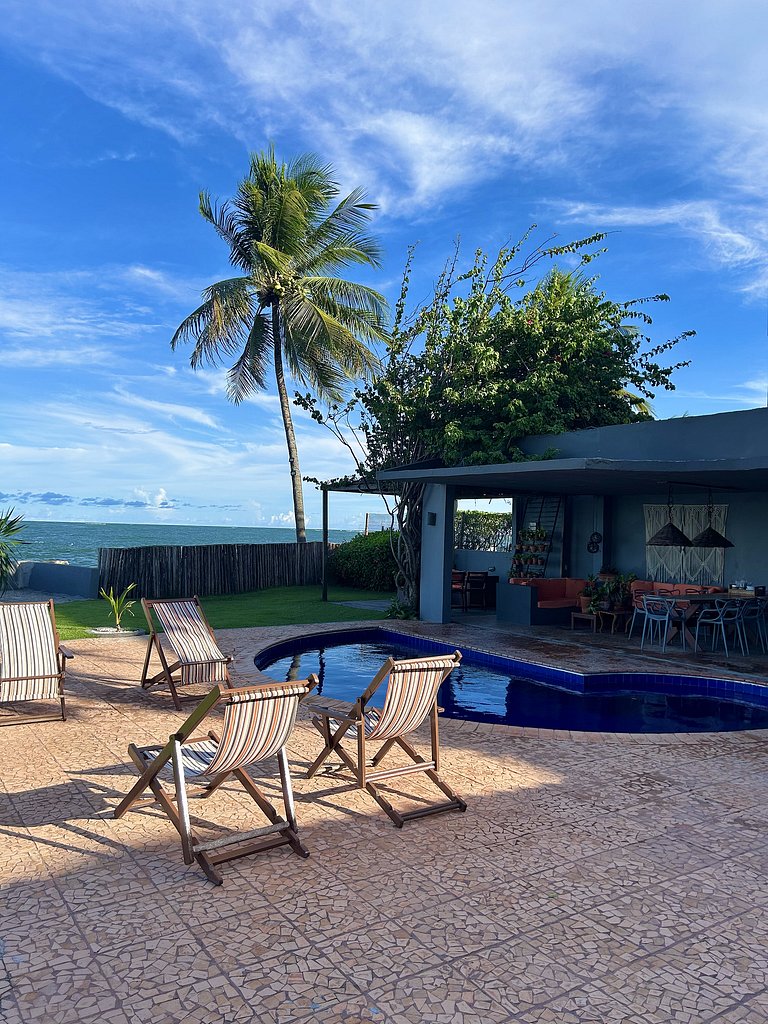 Casa Ilha| beira mar, piscina aquecida, 4 suítes