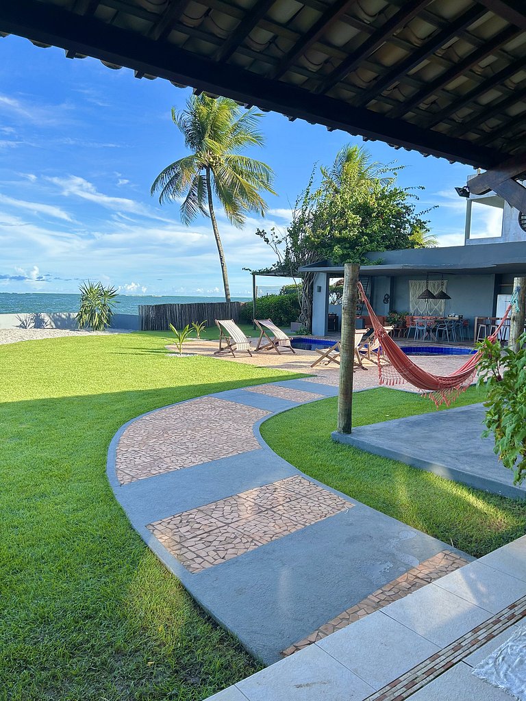 Casa Ilha| beira mar, piscina aquecida, 4 suítes
