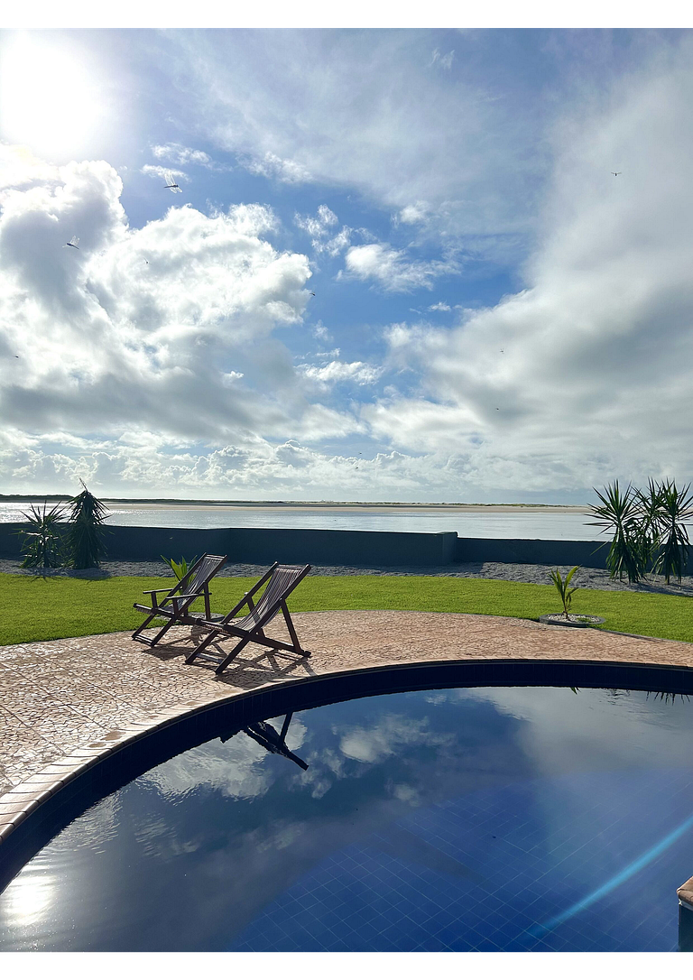 Casa Ilha| beira mar, piscina aquecida, 4 suítes