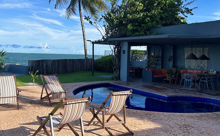 Casa Ilha| beira mar, piscina aquecida, 4 suítes