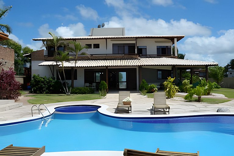 Casa Bruma |Pé na areia, encontro do rio com o mar