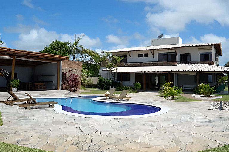 Casa Bruma |Pé na areia, encontro do rio com o mar