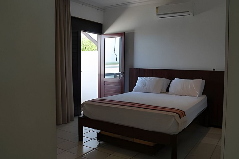 Casa Bruma |Pé na areia, encontro do rio com o mar