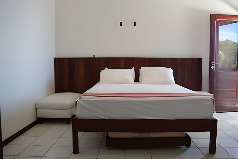 Casa Bruma |Pé na areia, encontro do rio com o mar