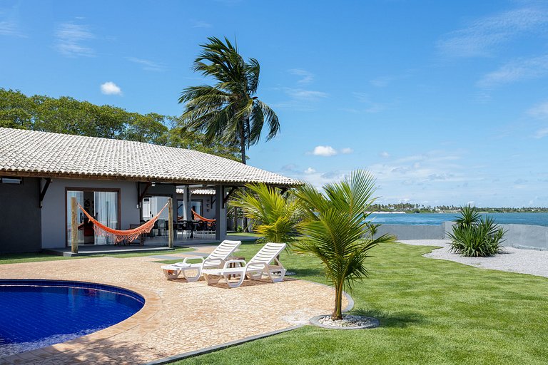 Casa Ilha| beira mar, piscina aquecida, 4 suítes