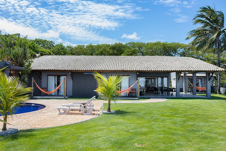 Casa Ilha| beira mar, piscina aquecida, 4 suítes