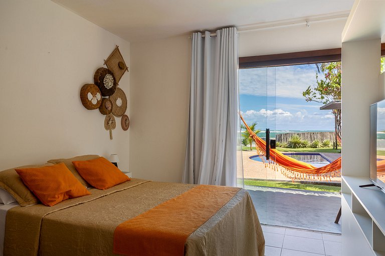 Casa Ilha| beira mar, piscina aquecida, 4 suítes