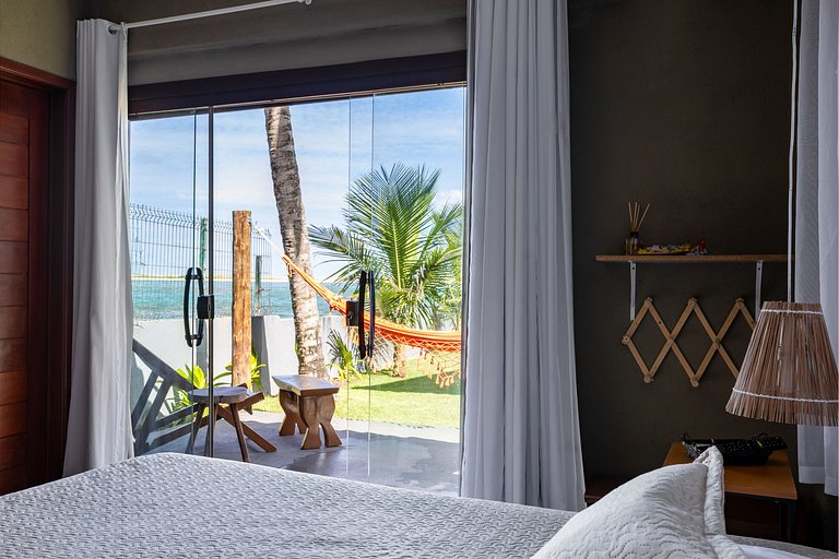 Casa Ilha| beira mar, piscina aquecida, 4 suítes