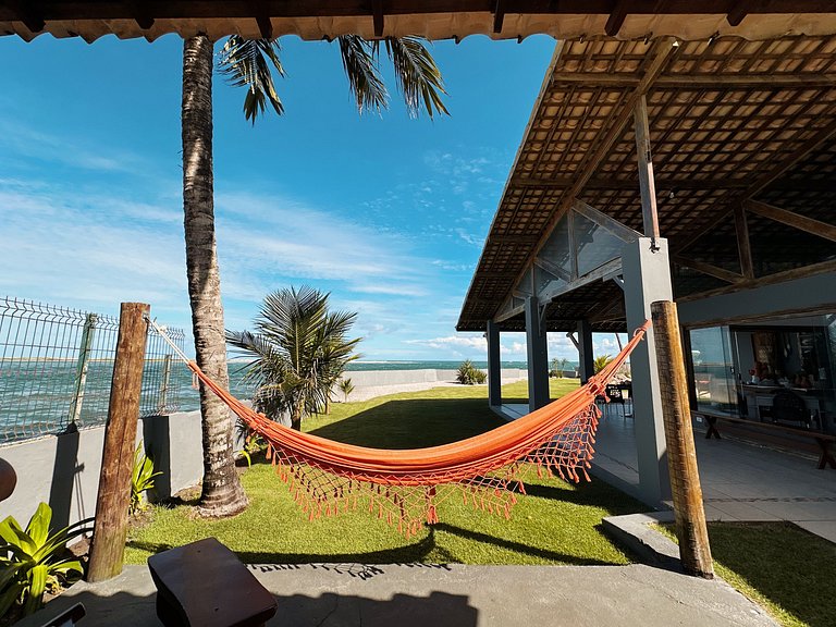 Casa Ilha| beira mar, piscina aquecida, 4 suítes