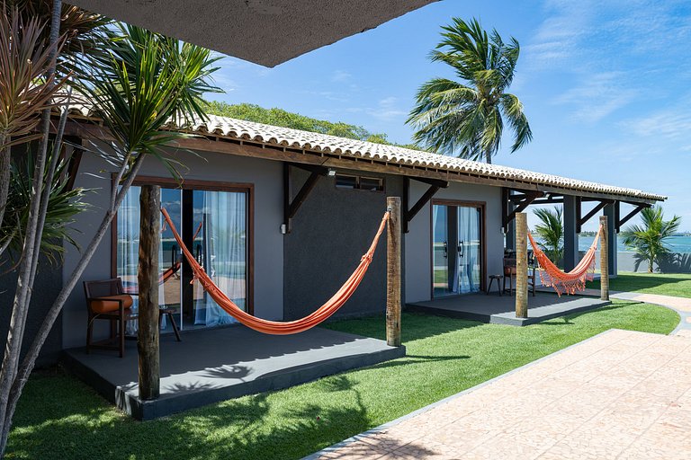 Casa Ilha| beira mar, piscina aquecida, 4 suítes