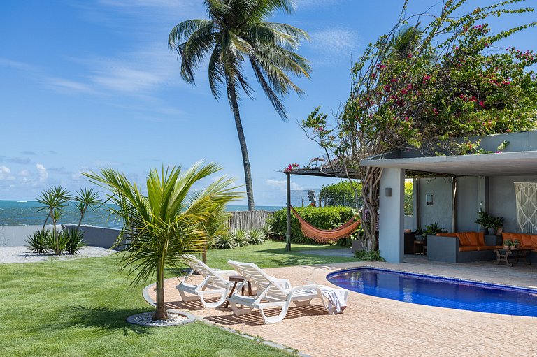 Casa Ilha| beira mar, piscina aquecida, 4 suítes