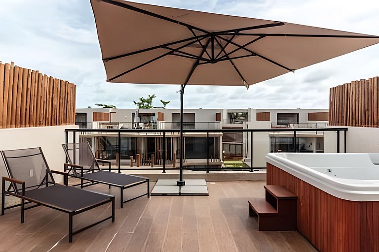 Duplex com rooftop em condomínio pé na areia