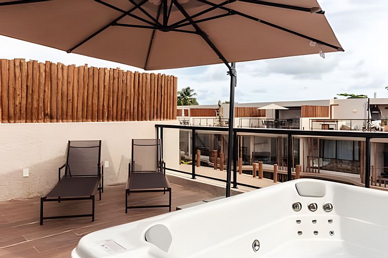 Duplex com rooftop em condomínio pé na areia