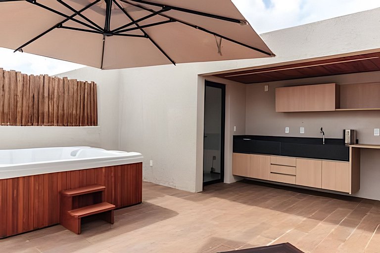Duplex com rooftop em condomínio pé na areia