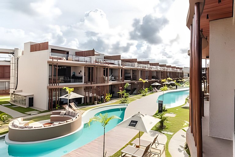 Duplex com rooftop em condomínio pé na areia