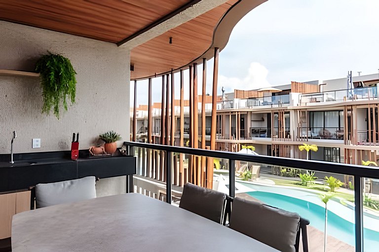 Duplex com rooftop em condomínio pé na areia