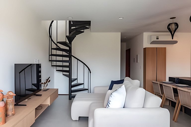 Duplex com rooftop em condomínio pé na areia