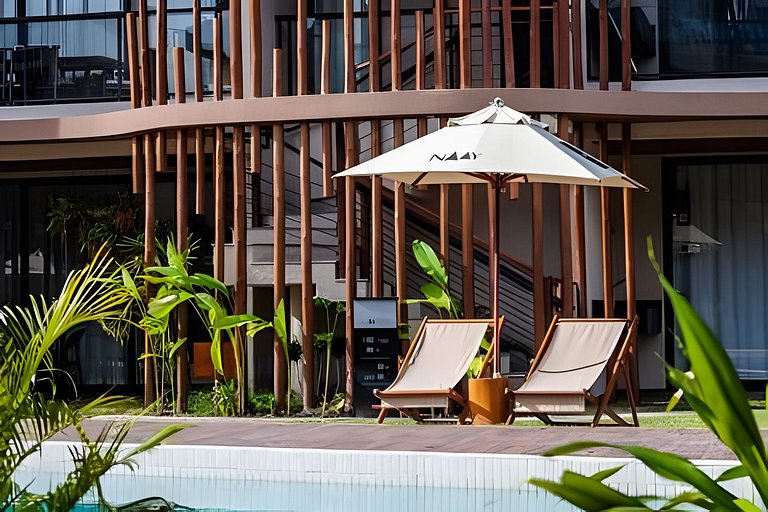 Duplex com rooftop em condomínio pé na areia