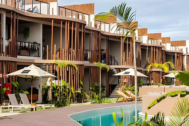 Duplex com rooftop em condomínio pé na areia