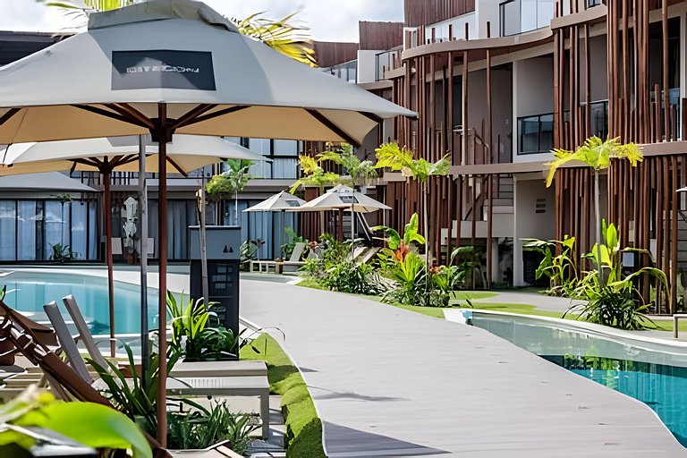 Duplex com rooftop em condomínio pé na areia