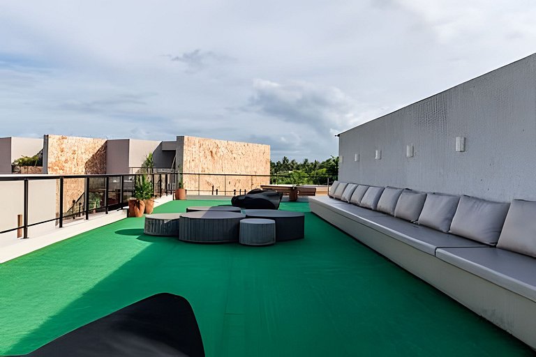 Duplex com rooftop em condomínio pé na areia