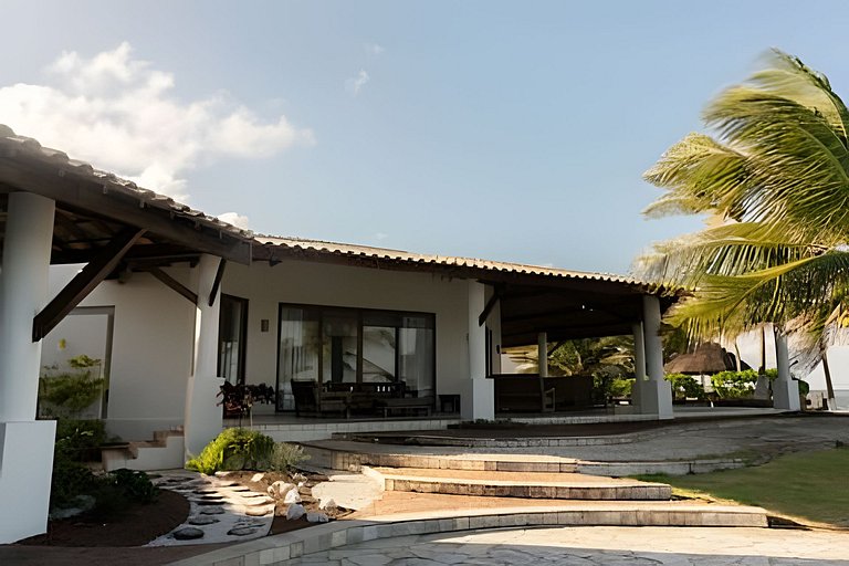 Mansão pé na areia, 10 suítes e piscina aquecida