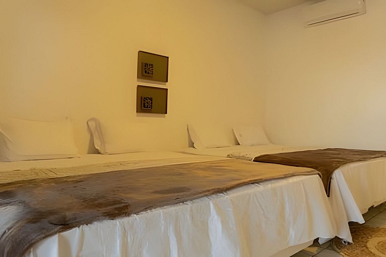 Mansão pé na areia, 10 suítes e piscina aquecida